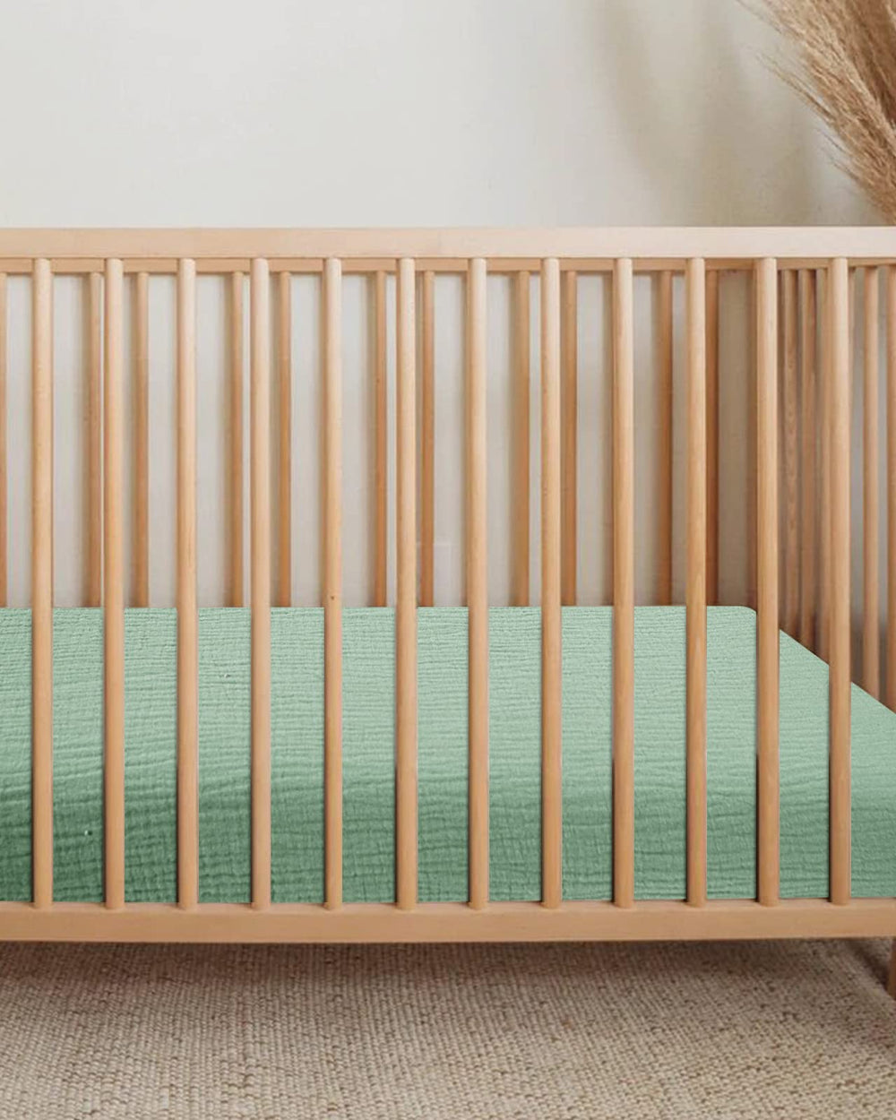 Meowcards beige-sage pattern adds calming aesthetic to nursery without overpowering decor.