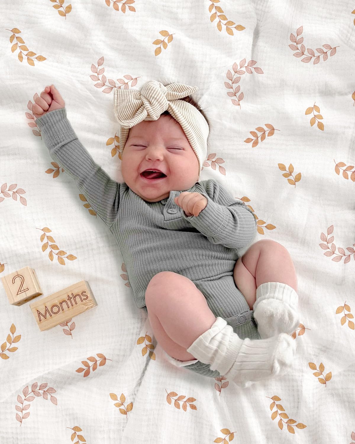 Meowcards swaddle blanket leaf durable muslin for long-lasting use.