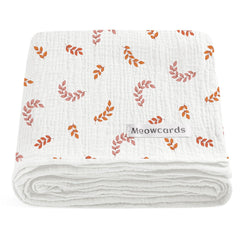 Meowcards swaddle blanket leaf fold demonstrates generous size for versatile newborn uses.
