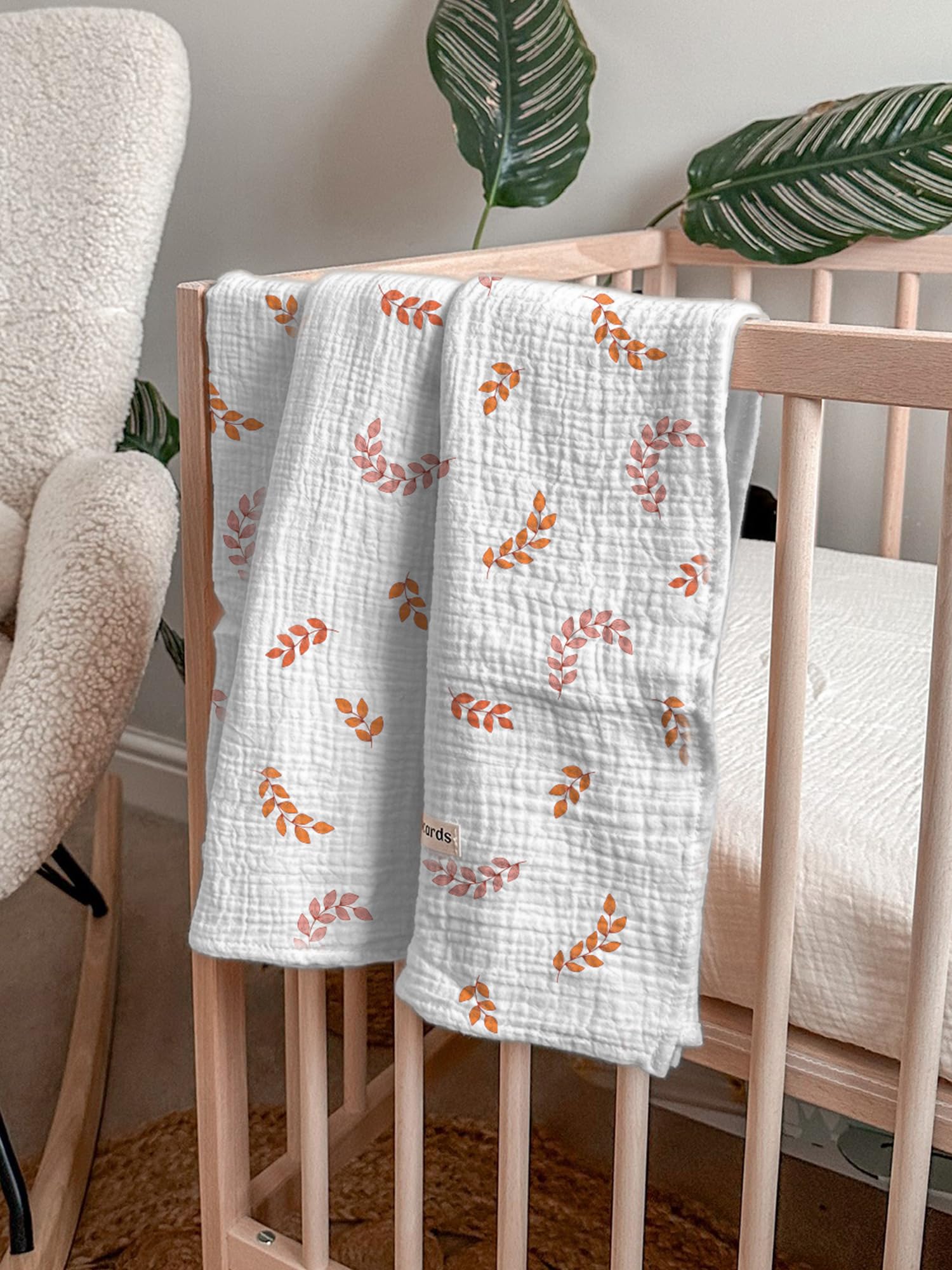 Meowcards swaddle blanket leaf nursing-cover demonstrates versatile feeding use.