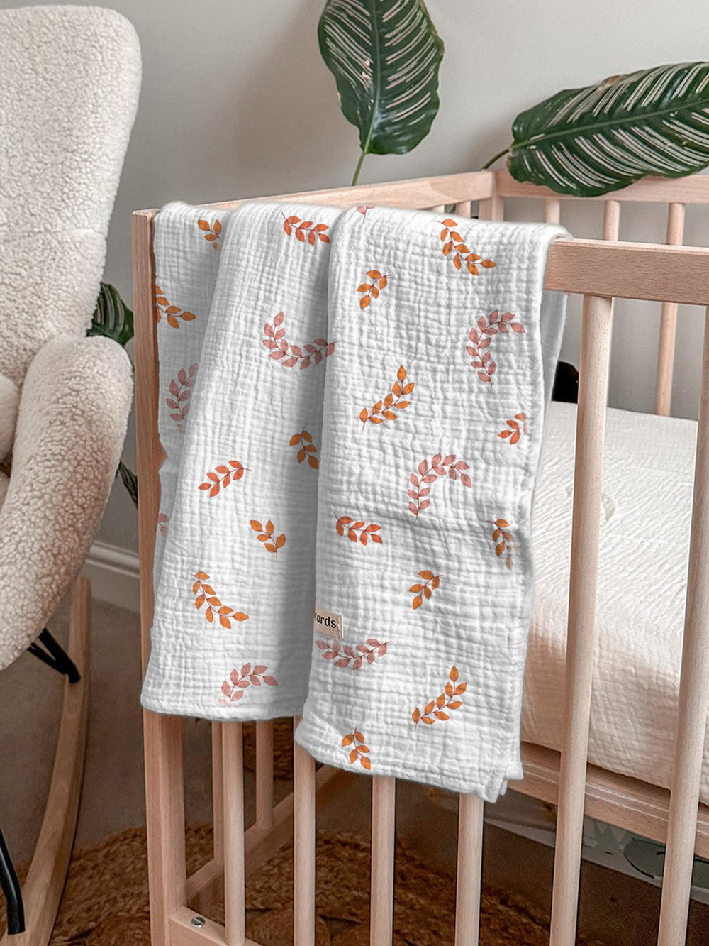 Meowcards swaddle blanket leaf nursing-cover demonstrates versatile feeding use.