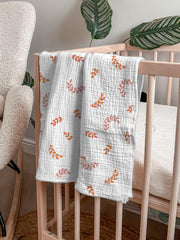 Meowcards swaddle blanket leaf nursing-cover demonstrates versatile feeding use.