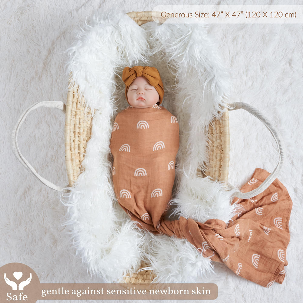 Meracorallo Muslin Swaddle Blanket baby swaddling scene illustrating secure wrap.
