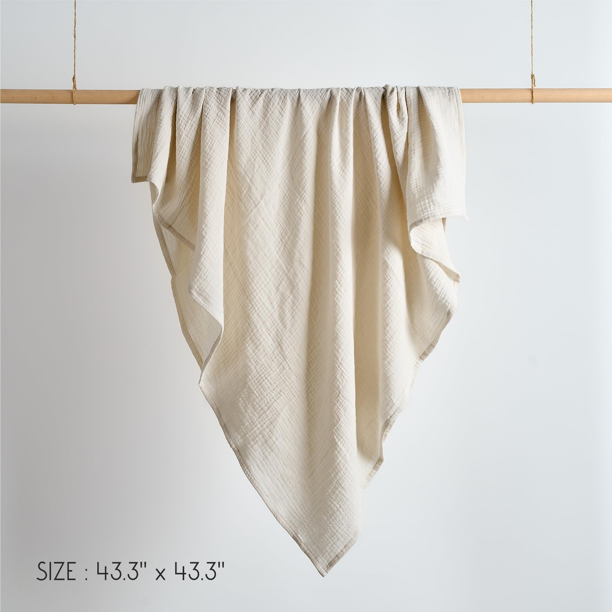 Meracorallo Muslin Swaddle Blanket baby-change setup illustrating changing-table use.