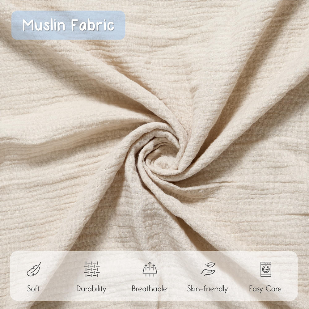 Meracorallo muslin swaddle blanket used as a multi-use baby blanket in nursery.