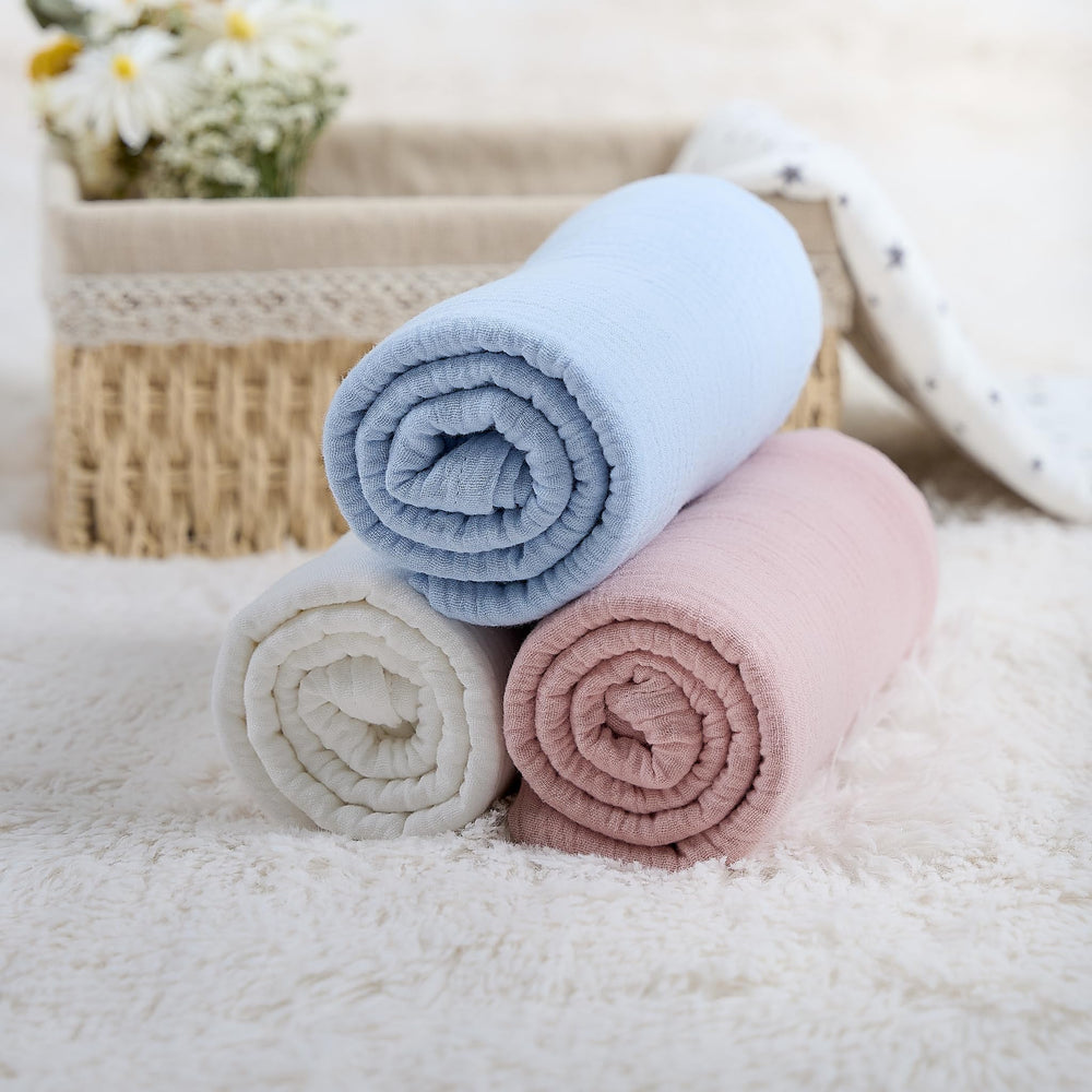 Meracorallo muslin swaddle blanket white color for nursery harmony.