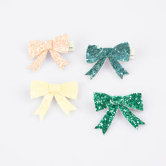 Meri Meri glitter bow clip 4-pack in four colors for instant party-ready style.