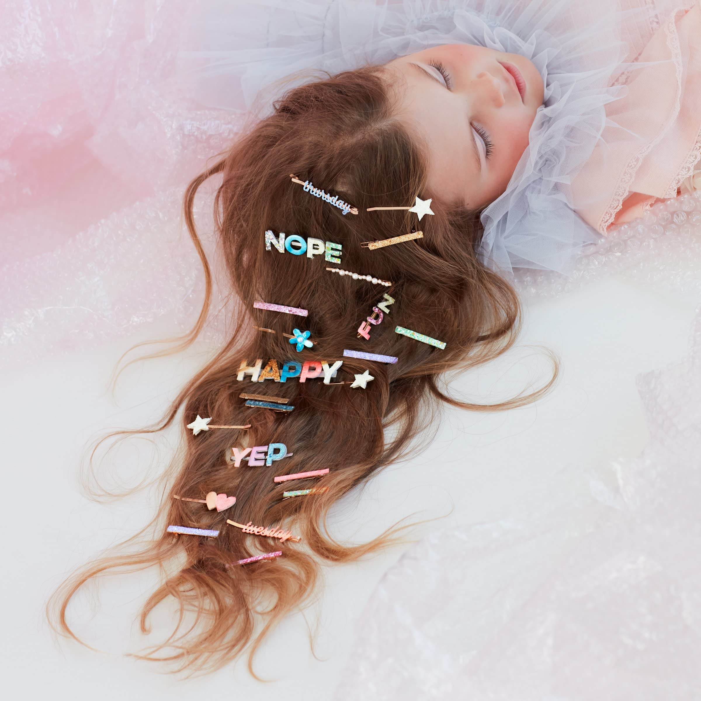 Meri Meri party-ready hair accessories rainbow clips for celebrations.