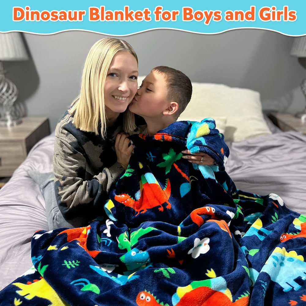Mermaker dinosaur blanket on sofa supports family movie nights and shared warmth.