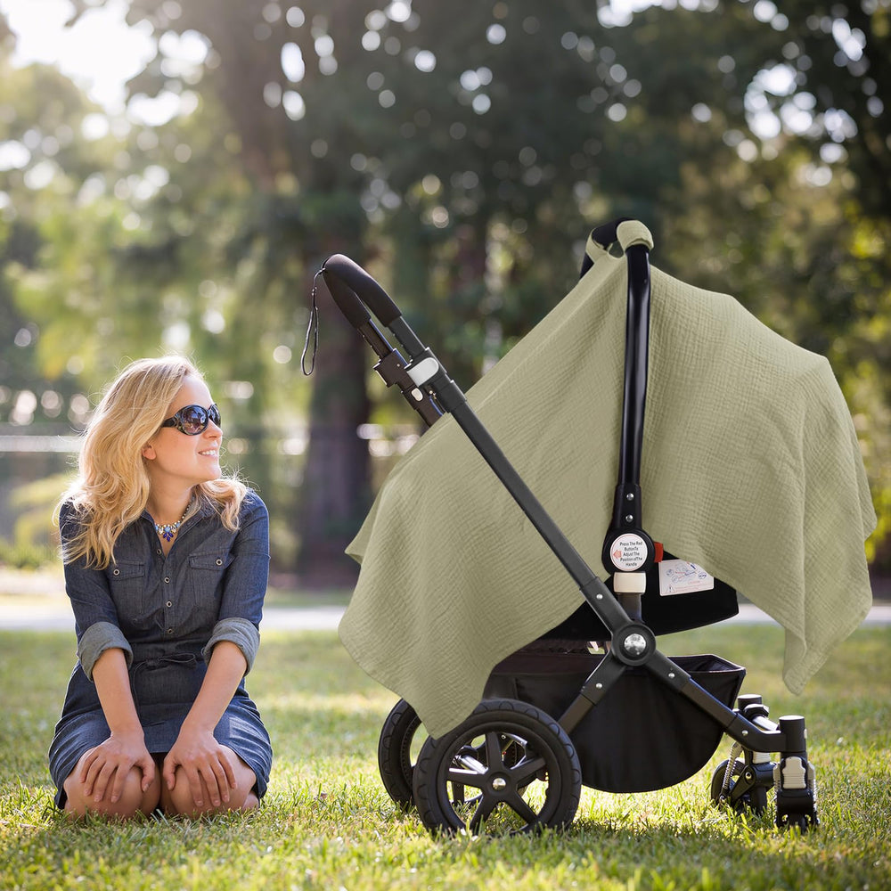 Metplus Muslin car seat cover used as breastfeeding cover with privacy.