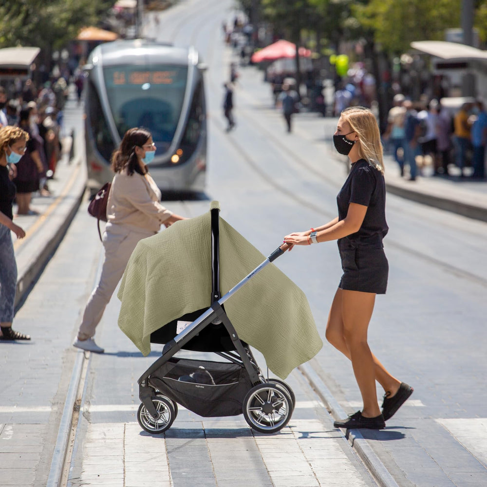 Metplus Muslin car seat cover portable and folded for on-the-go.
