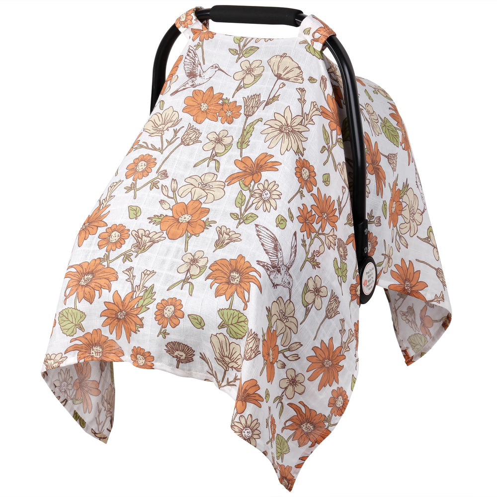 Metplus muslin carseat cover on stroller offering breathable sun protection