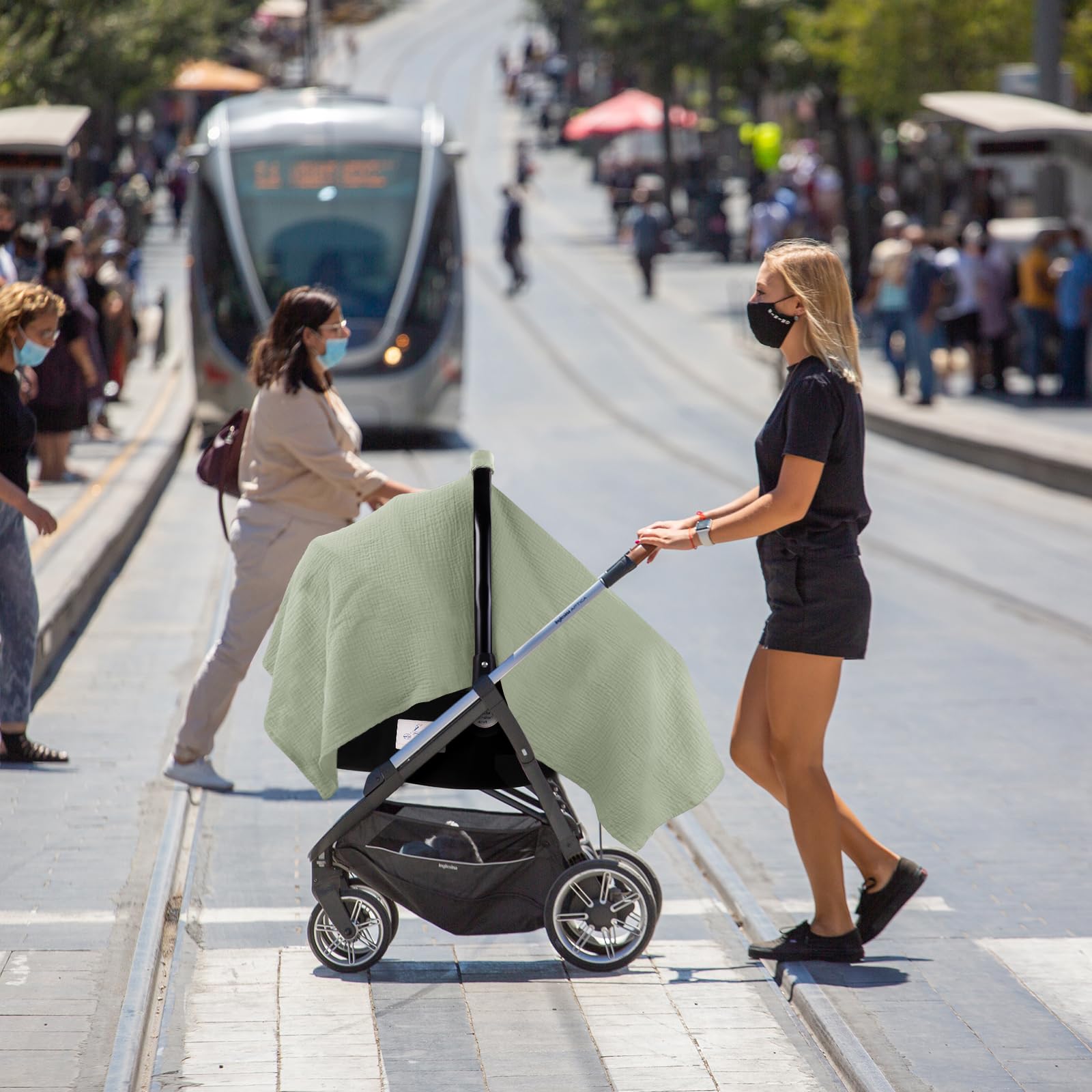 Metplus stroller sunshade in use blocks glare with breathable fabric.
