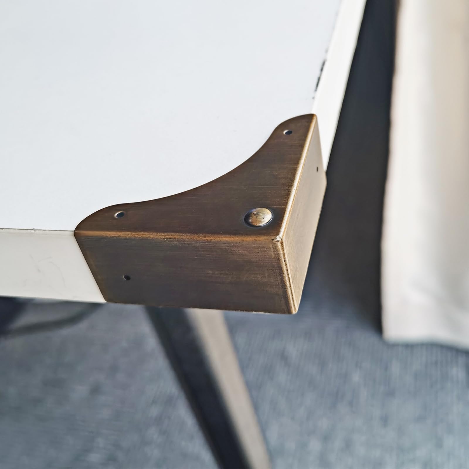 Mewuthede rust-resistant brass finish corner protector endures moisture and outdoor use.