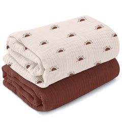 MiFlor muslin swaddle blankets folded, showing soft, breathable cotton for newborn comfort.