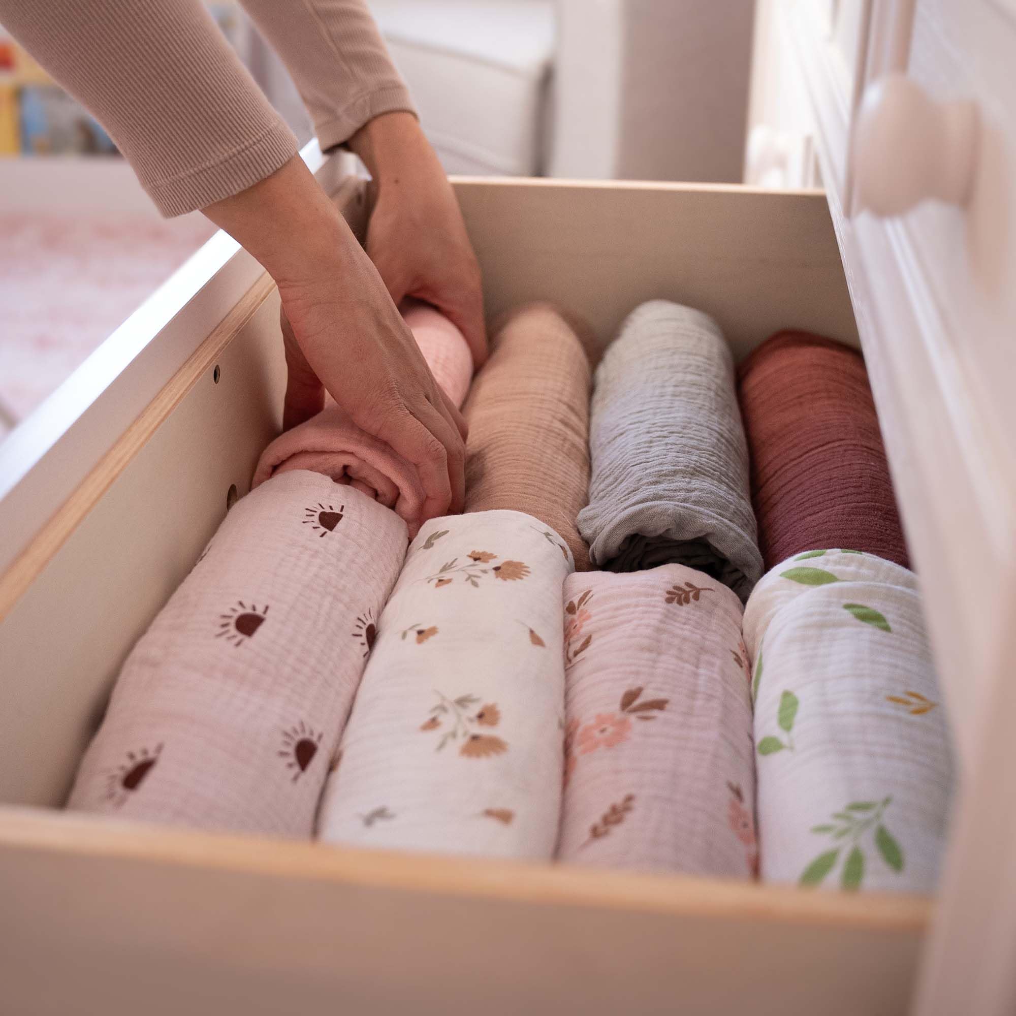 MiFlor swaddle being machine-washed highlights durability and easy-care.