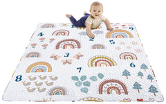 MIIMER Boho Rainbow play mat folded for easy storage and portability.