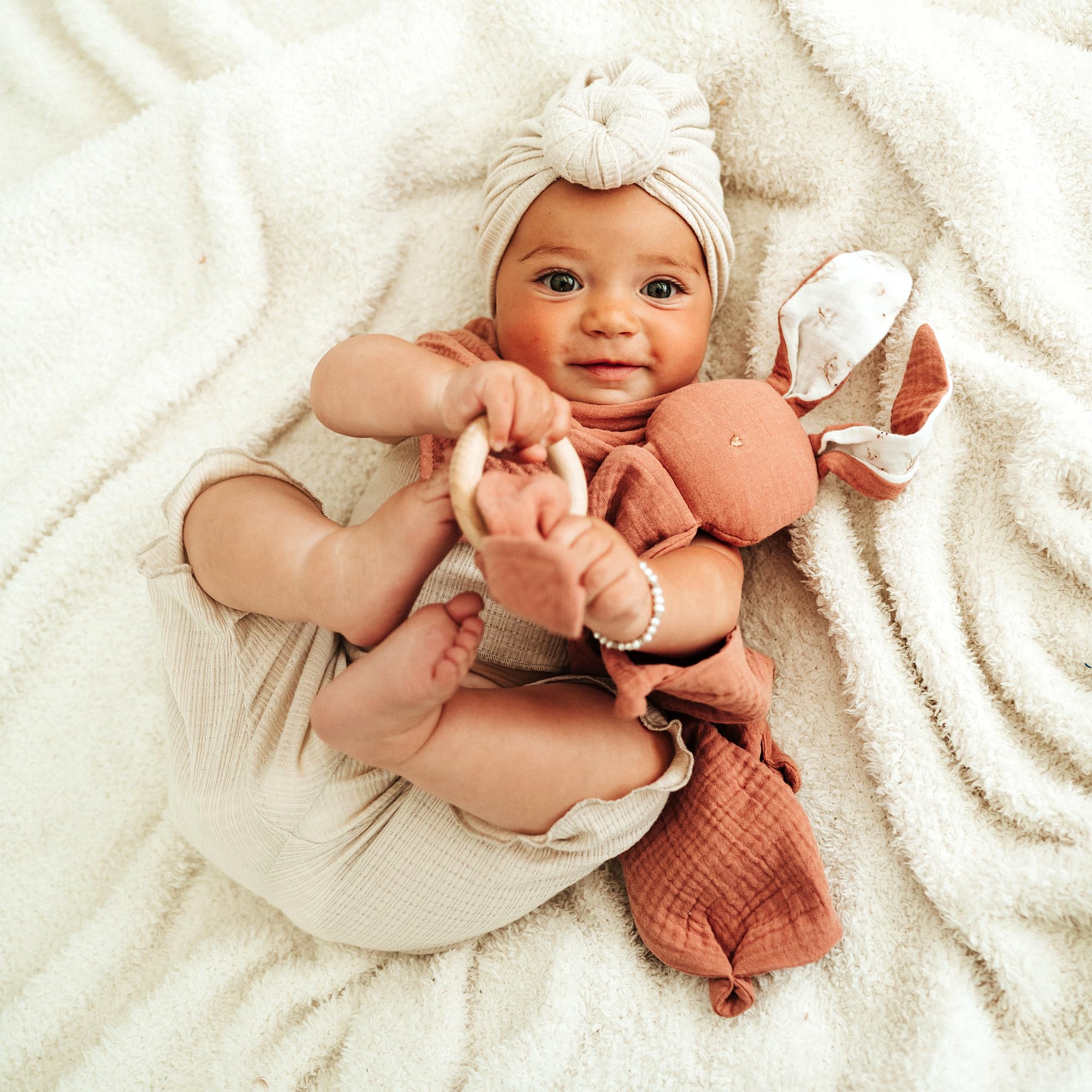Mikito bunny lovey close-up muslin texture highlights breathable fabric.