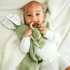 Mikito organic cotton muslin lovey bunny demonstrates breathable fabric for gentle baby comfort.