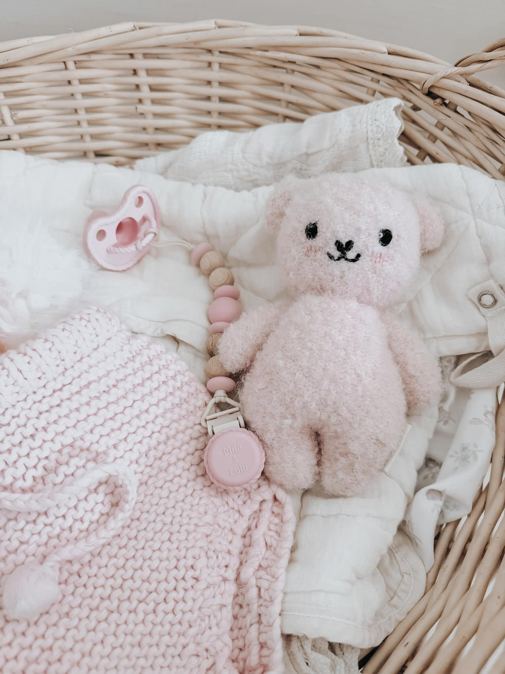 Mila & Lulu two-pack neutral pacifiers provide versatile outfits-ready baby essentials.