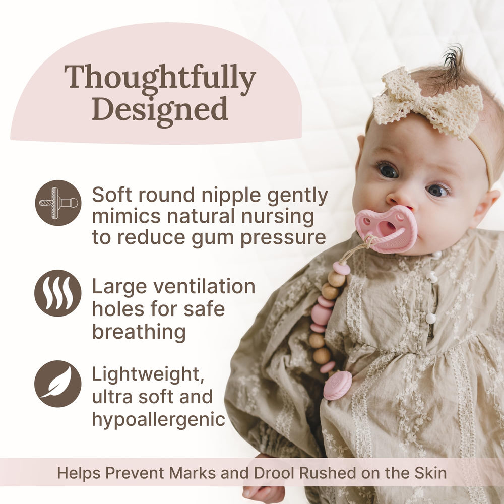 Mila & Lulu curved shield silicone pacifier with airflow design for comfortable breathing.