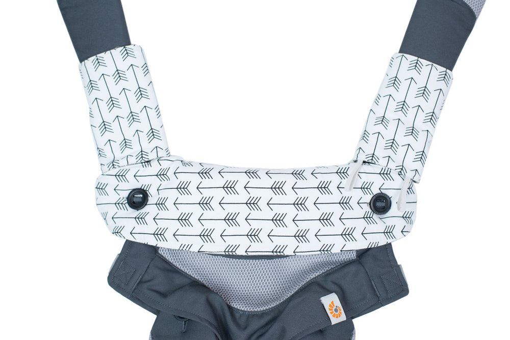 Mila Millie teething pad care closeup illustrating easy machine wash in cold water.