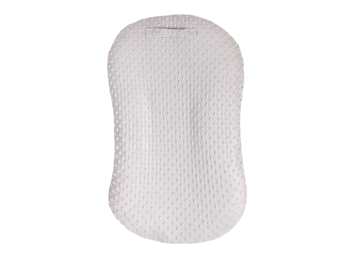 Mila Millie water-resistant removable cover on newborn lounger protects against spills and messes.
