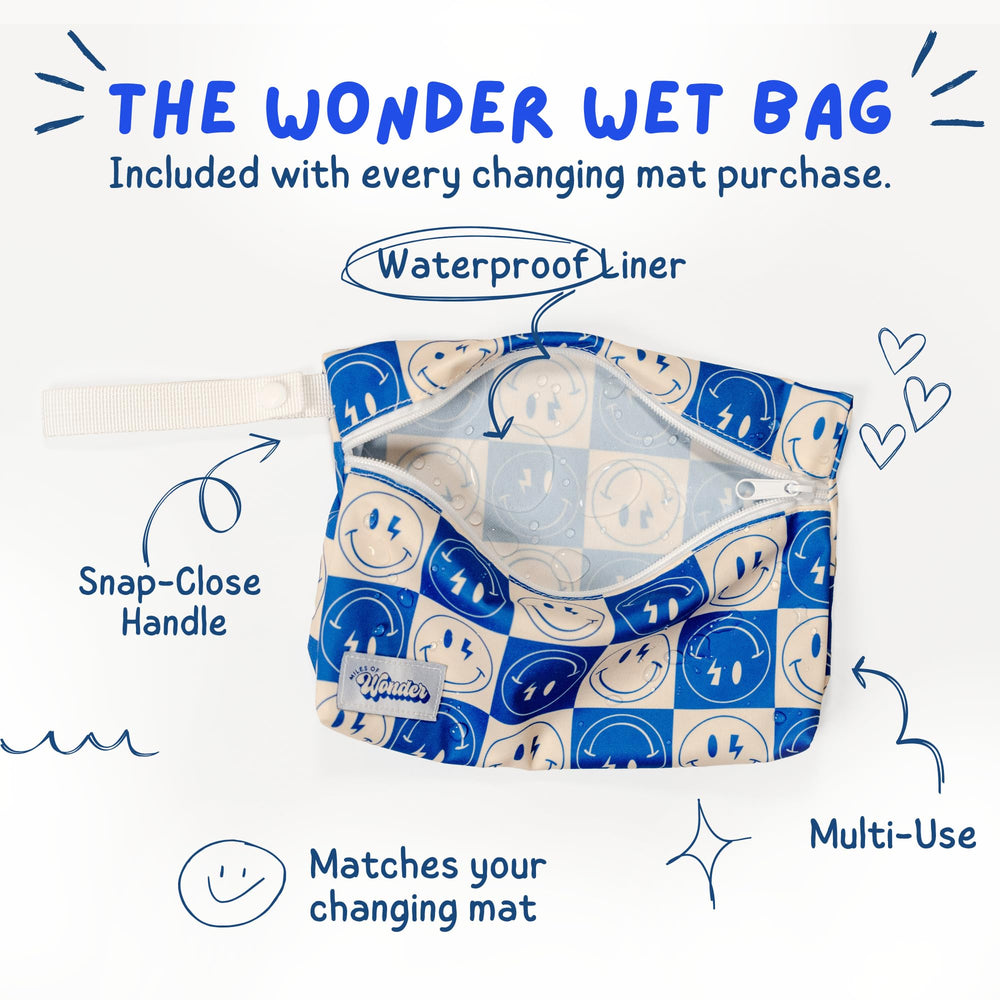 Miles of Wonder folded travel changing mat tucked into a compact bag.