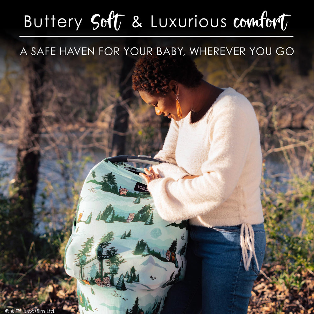 Milk Snob car-seat cover rayon-blend fabric feels soft and protects from sun and wind.