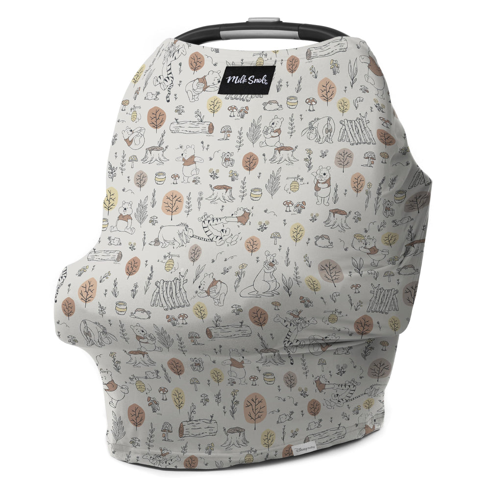 Milk Snob Disney 5-in-1 cover with Winnie Pooh design offers stylish privacy and versatility.