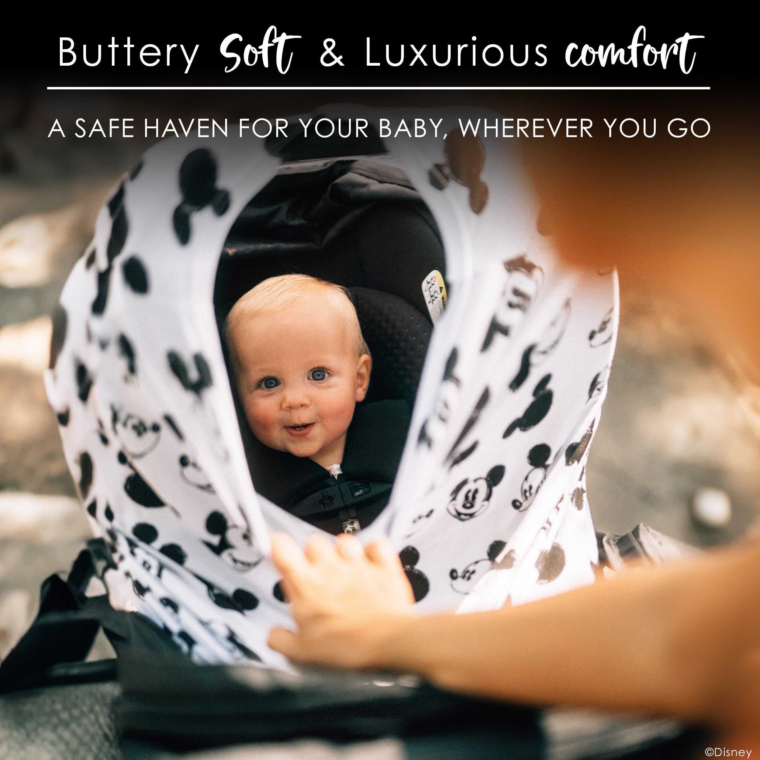 Milk Snob Disney cover car seat shield protects baby from sun and wind.