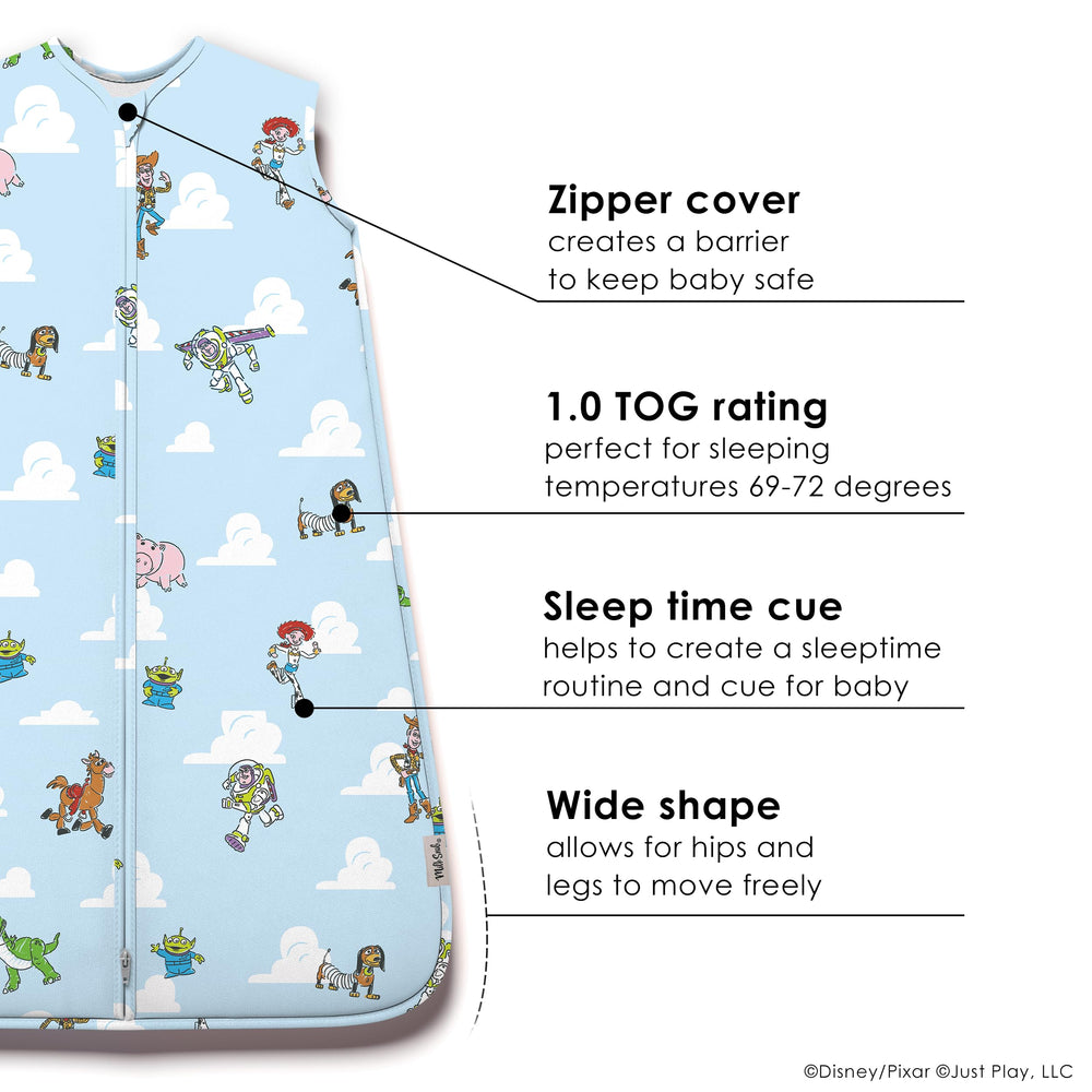 Milk Snob Disney sleeping sack worn by baby in crib offers secure comfort.