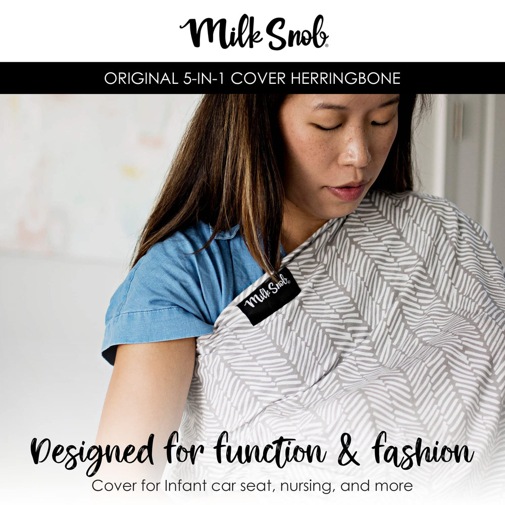 Milk Snob Original 5-in-1 cover provides privacy during breastfeeding in public spaces.