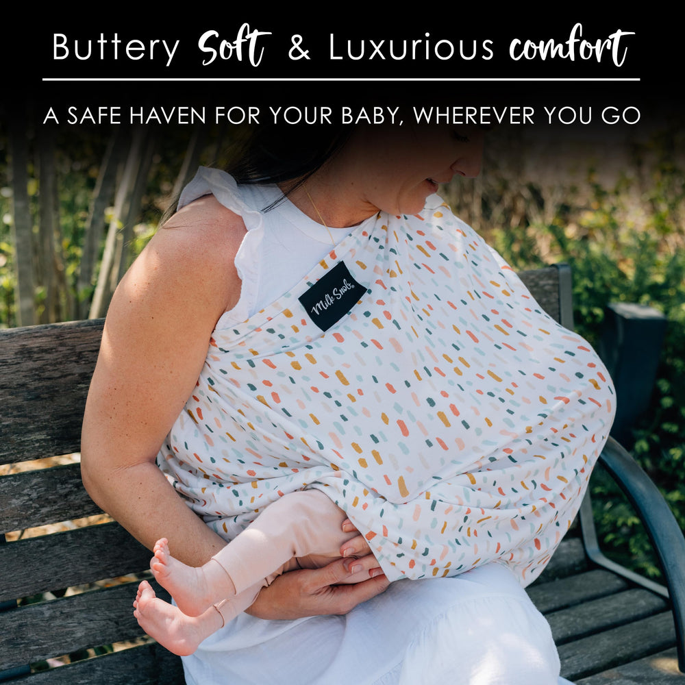 Milk Snob Original 5-in-1 cover stroller shield for privacy and wind protection.