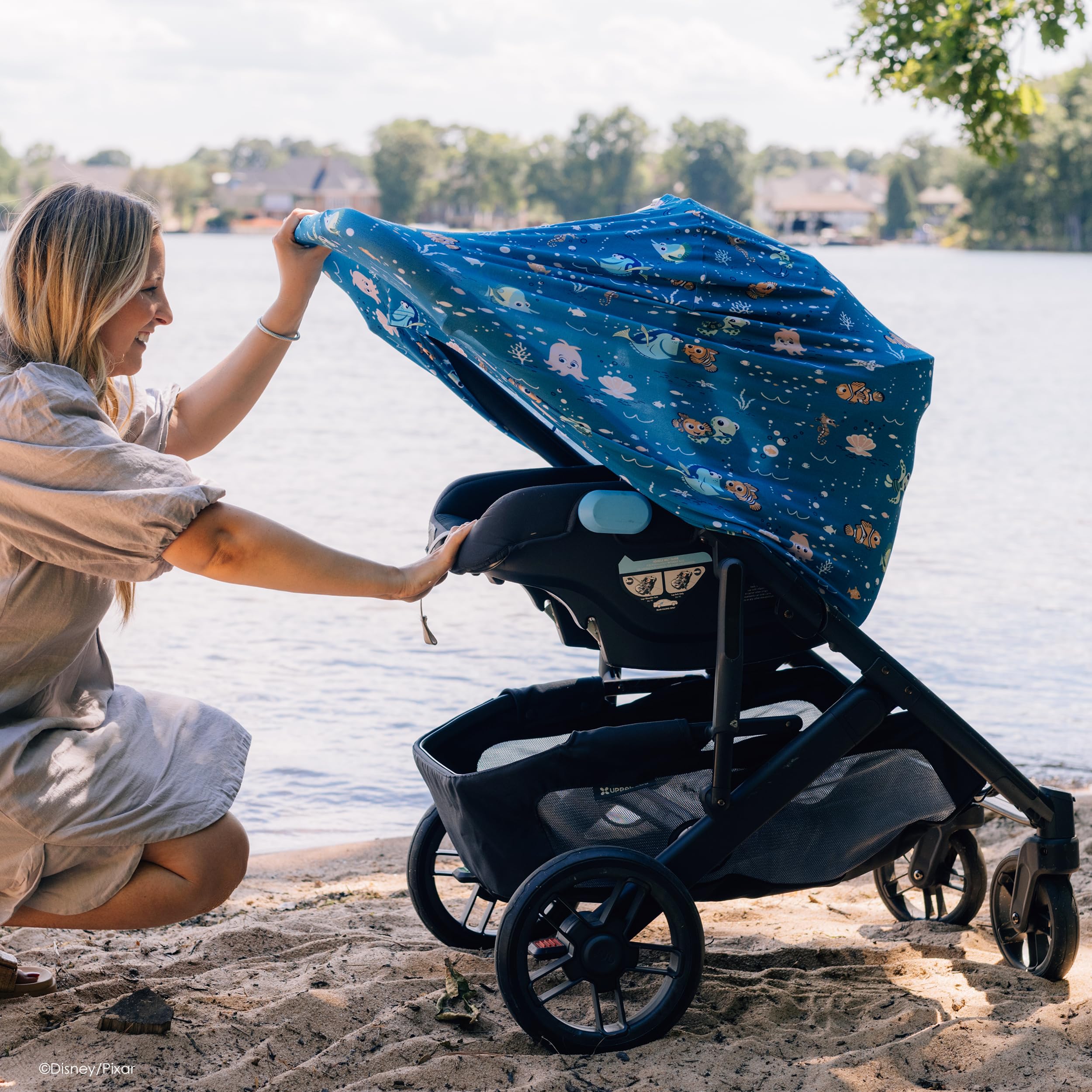 Milk Snob canopy cover with Finding Nemo design creates privacy and airflow