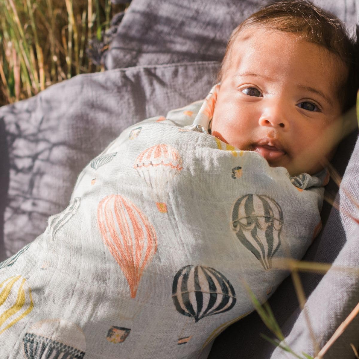 Milkbarn 47x47 swaddle size shown for secure newborn cuddles