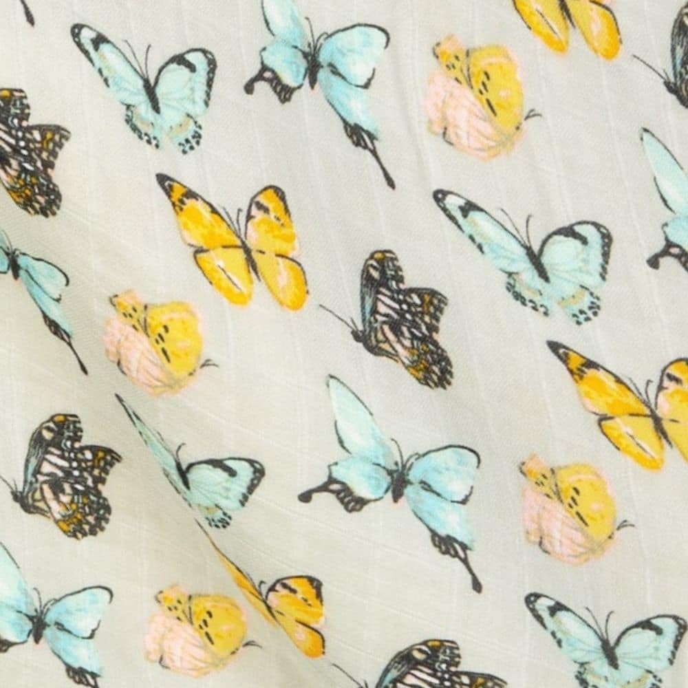 Milkbarn Butterfly muslin two-layer — breathable comfort for sensitive skin during snuggles.