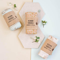 Milkbarn nursery scene with Firefly design swaddle ready for daily soothing moments