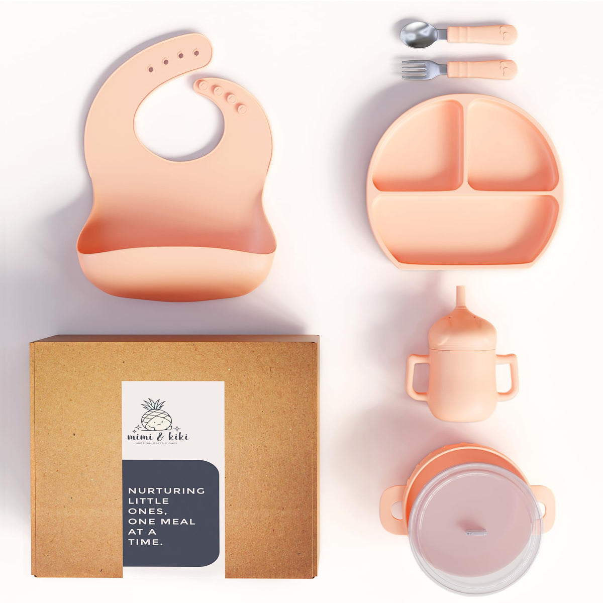 mimi & kiki BPA-free silicone baby plate in light pink for mess-free self-feeding.