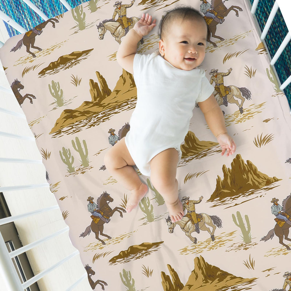 Mindsoft cowboy crib sheet neatly fits a standard crib for a secure sleep surface.