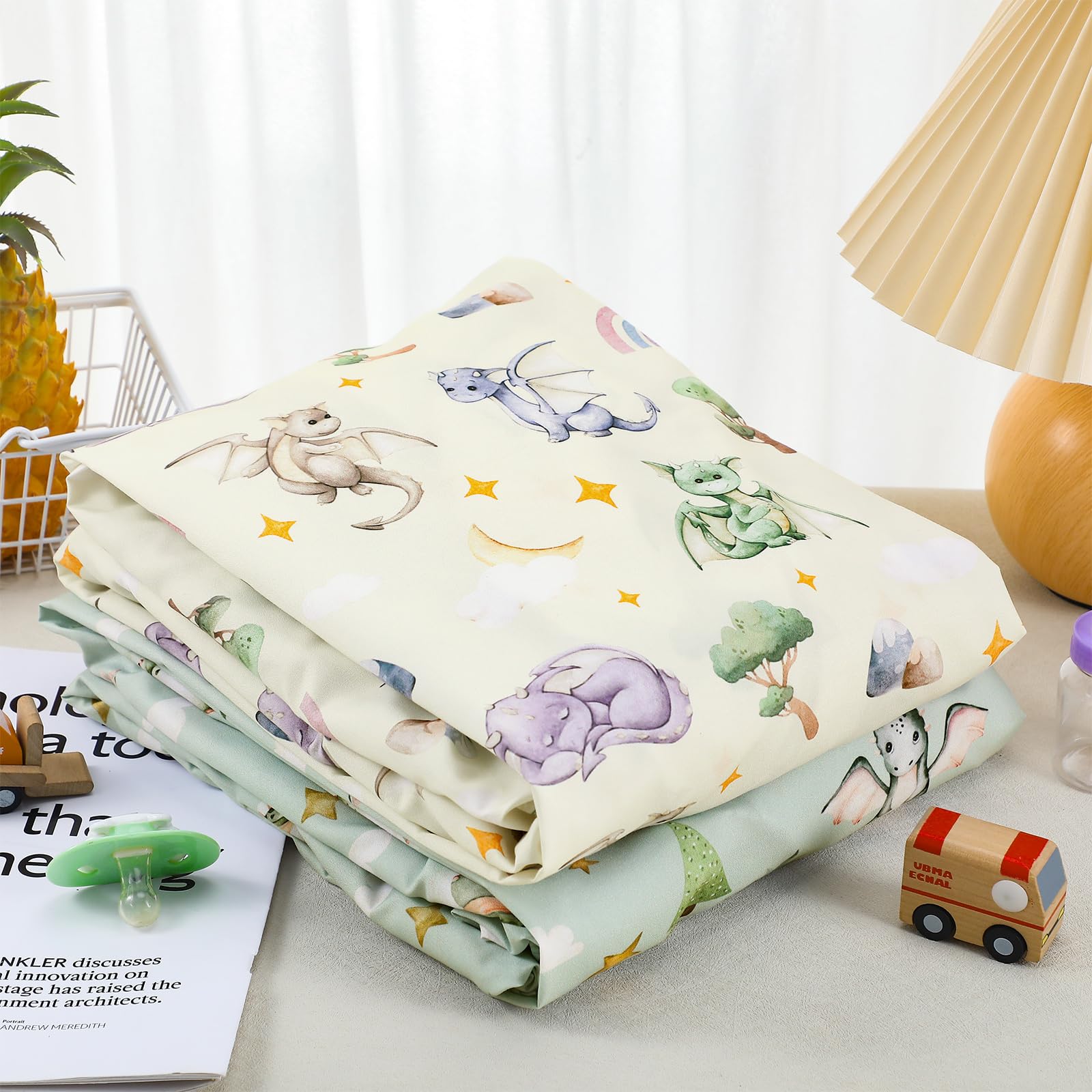 Mindsoft watercolor dragon crib sheet complements nursery decor and dragon-themed rooms.