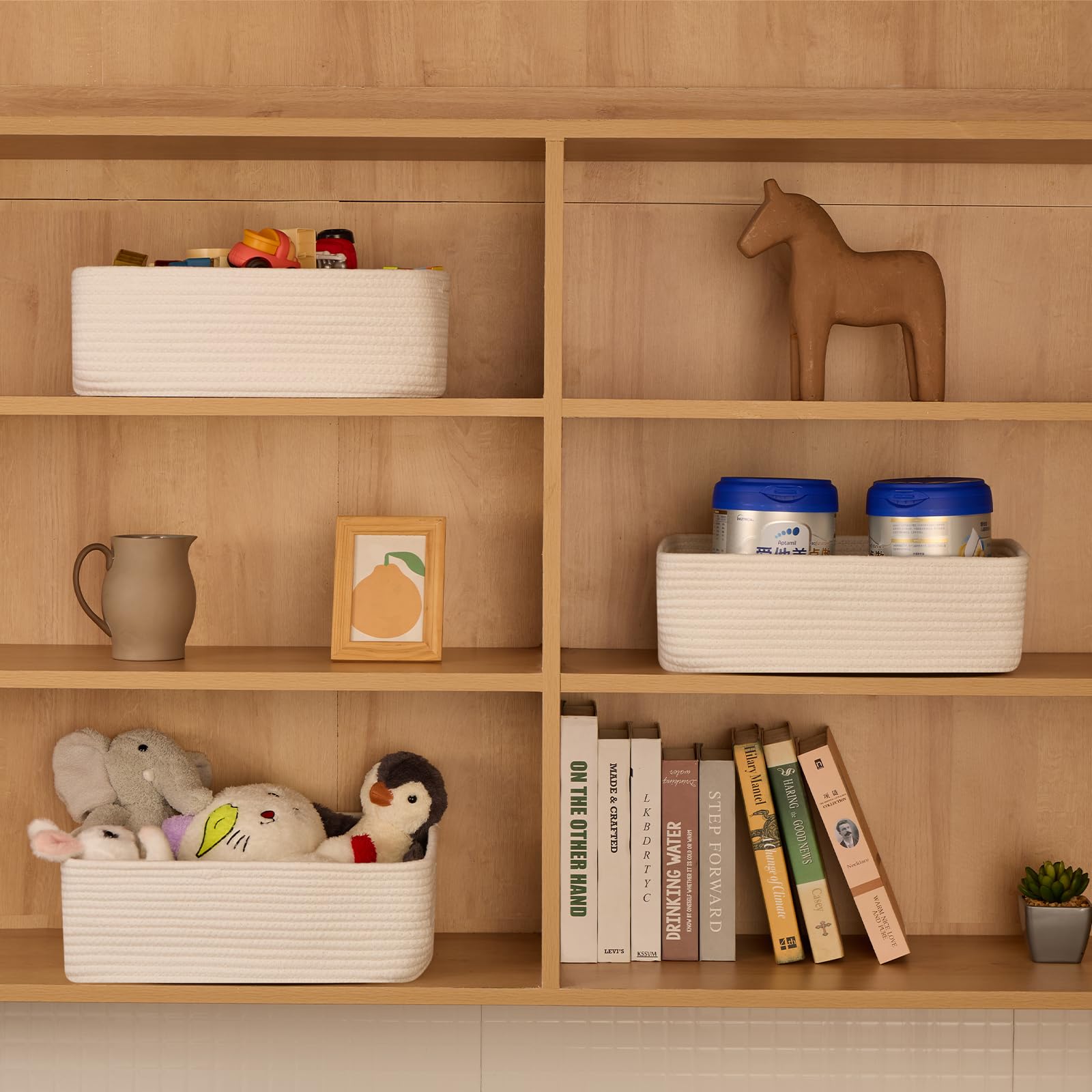 MiniArk bathroom organization baskets on shelf demonstrate clutter reduction.