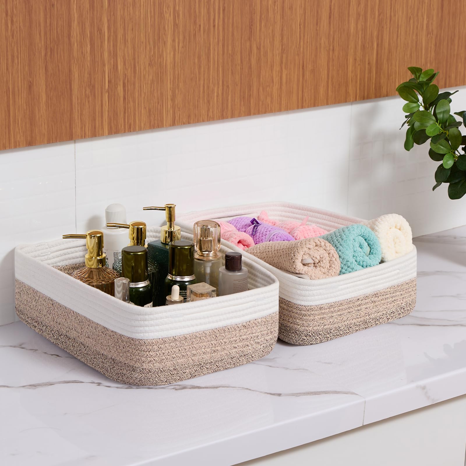 MiniArk large basket gradient brown filled with towels to show laundry organization.