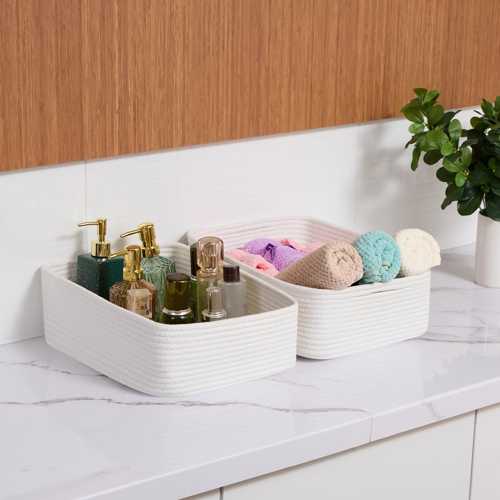MiniArk large shallow basket holding blankets for organized storage.