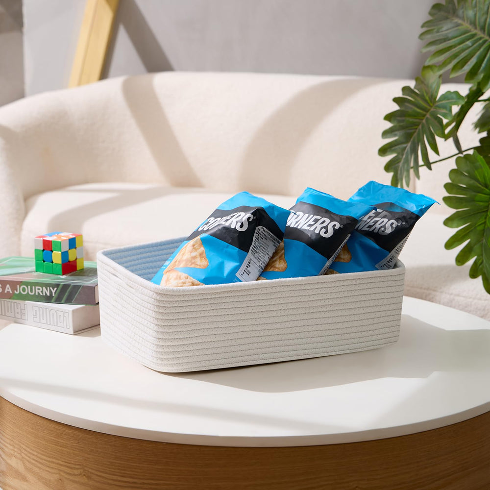 MiniArk large shallow basket holding towels on bathroom shelf.