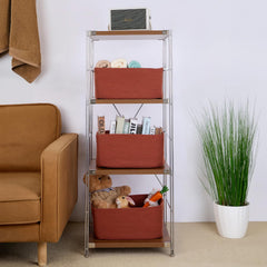 MiniArk oxide-red large basket in baby nursery keeps essentials neat.