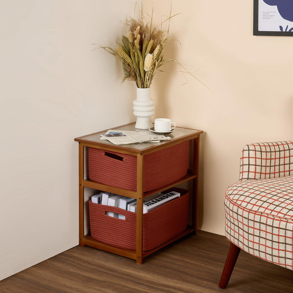 MiniArk oxide-red large basket blanket organizer on a bed.
