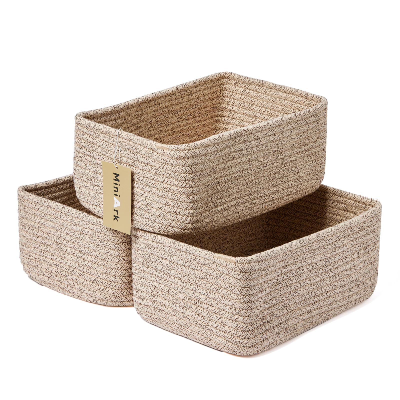 MiniArk small storage baskets front view on a clean surface showing warm woven texture