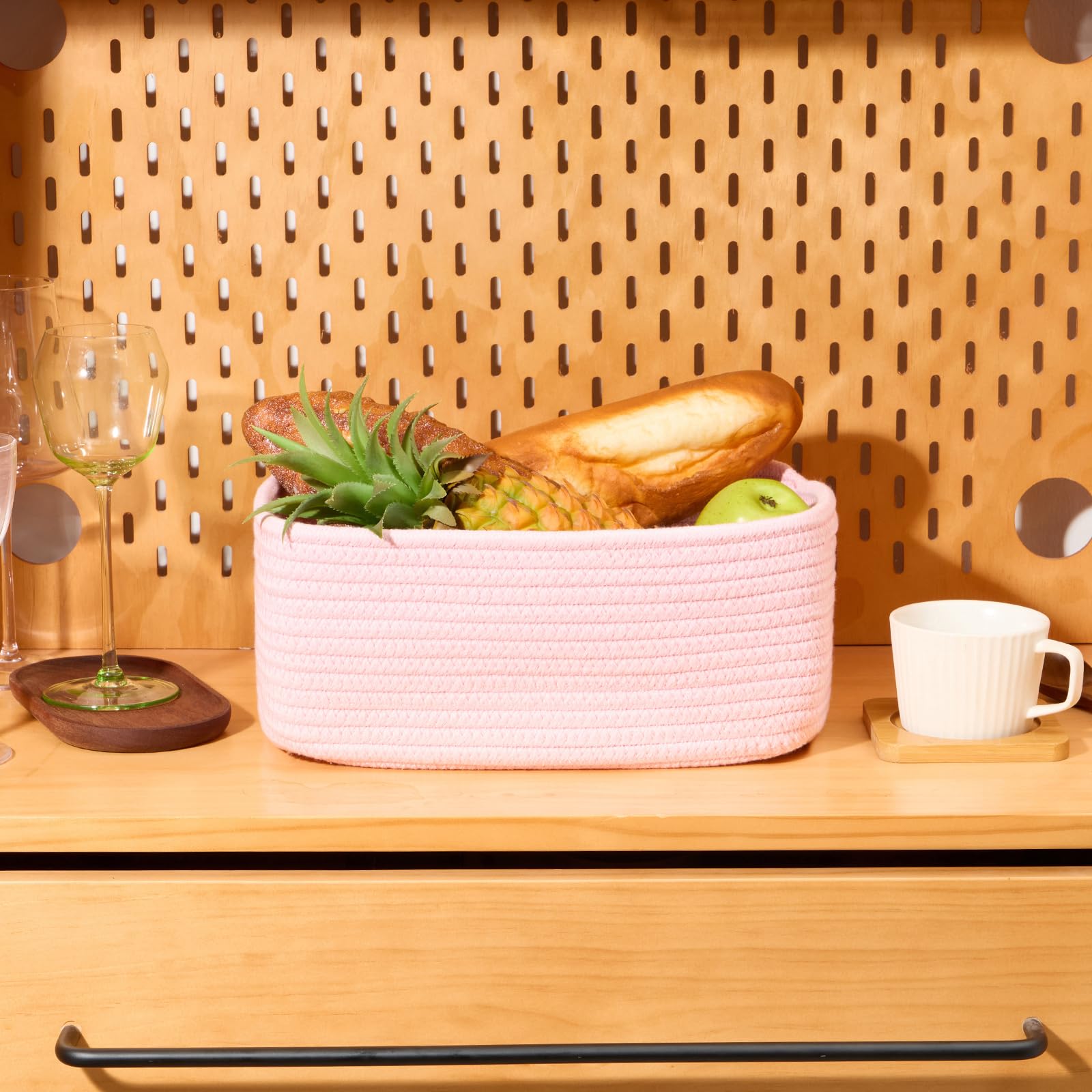 Miniark nursery-use image suggests convenient toy and diaper organization.