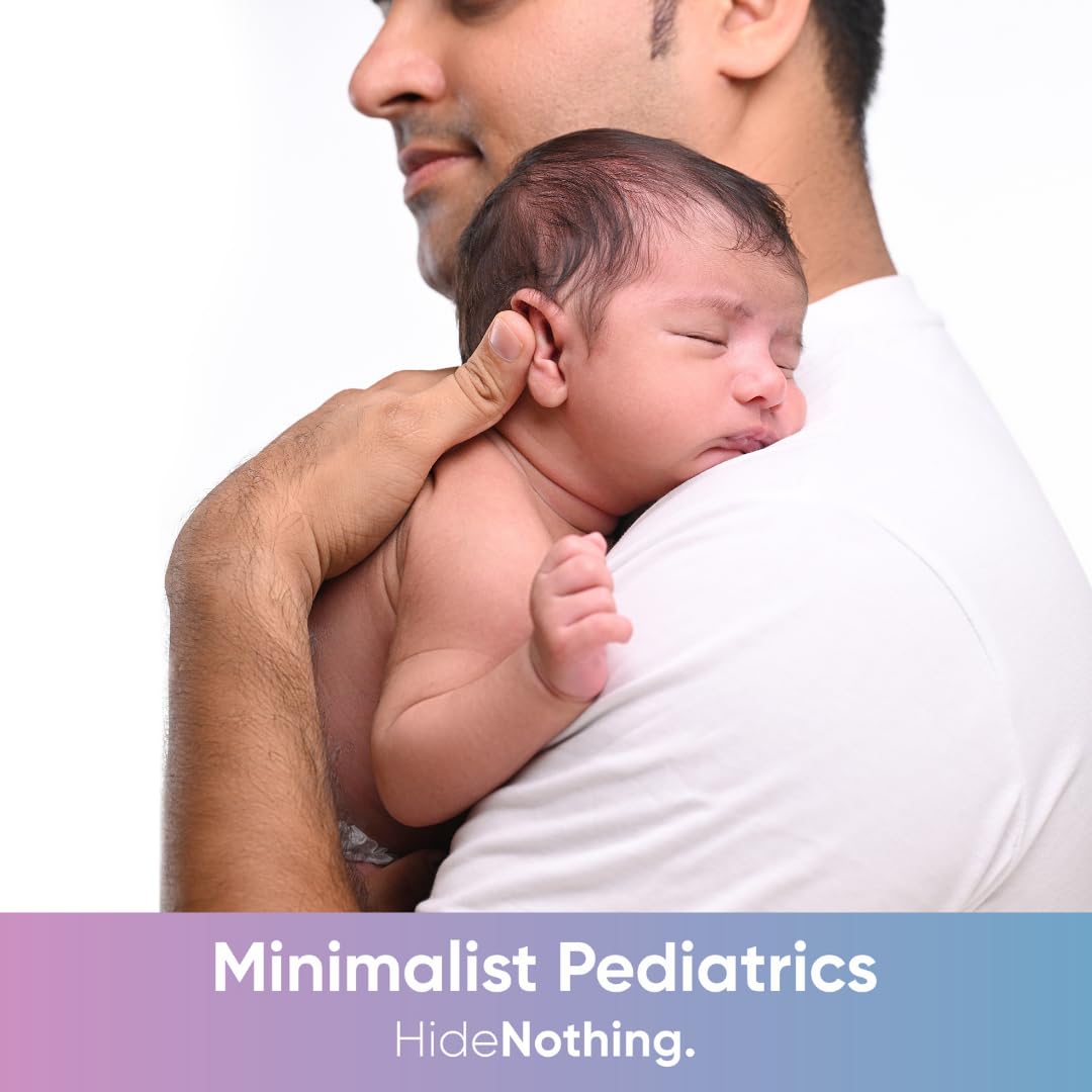 Minimalist Baby Gentle Head to Toe Wash visible foaming lather during bath.
